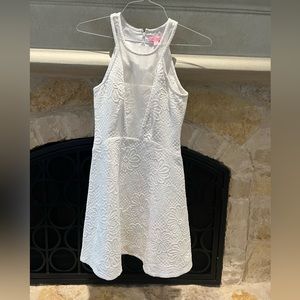 White floral Lilly Pulitzer dress with mesh top detail.